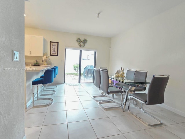 view of tiled dining space