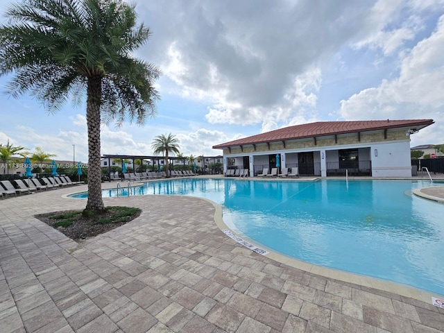 view of pool featuring a patio