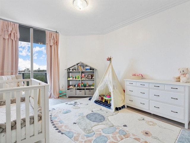 bedroom featuring ornamental molding