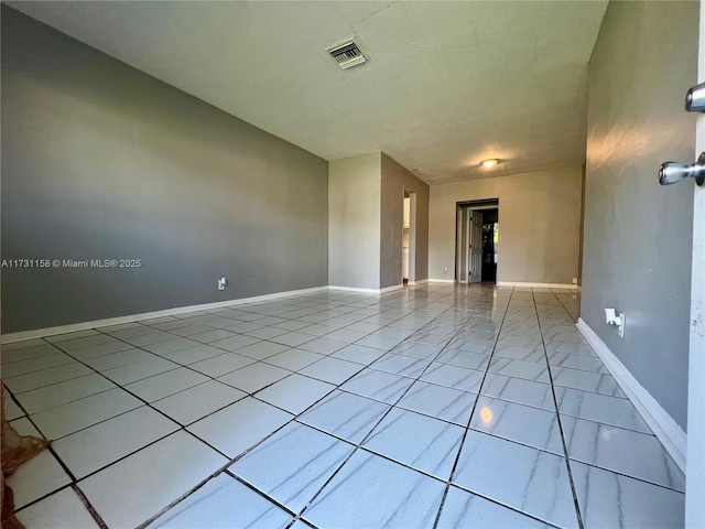 view of tiled empty room