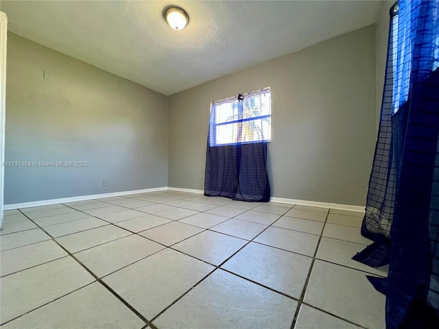 view of tiled empty room