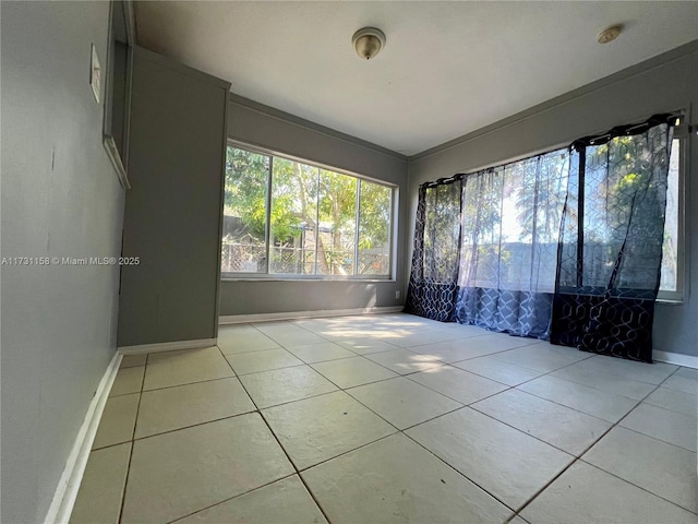 view of tiled spare room