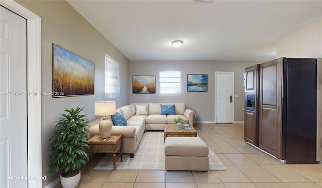 living room featuring light tile patterned flooring