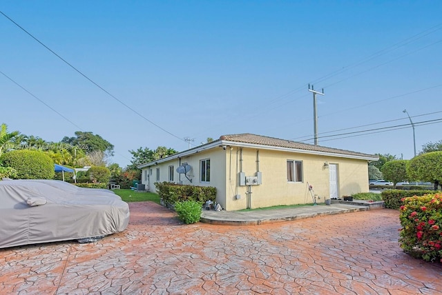 view of home's exterior featuring a patio