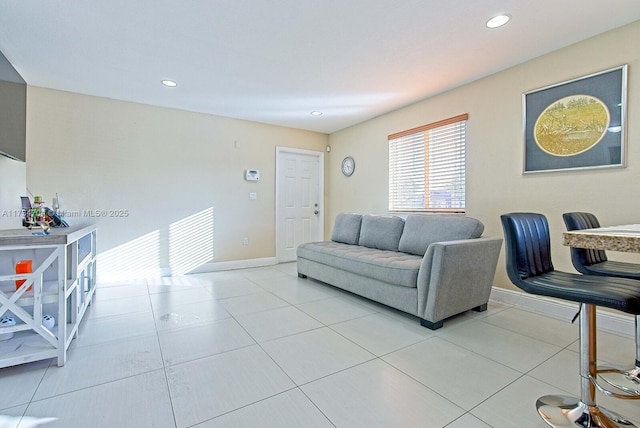 living room with light tile patterned floors