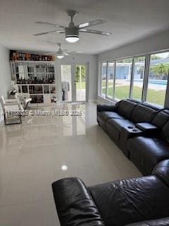 living room with ceiling fan