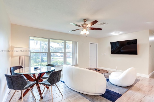 living room featuring ceiling fan