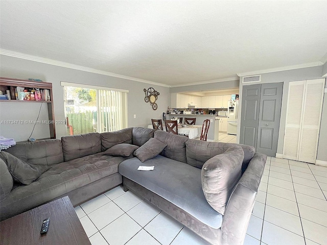 tiled living room featuring ornamental molding