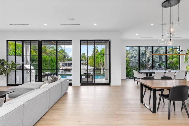 living room with light hardwood / wood-style flooring