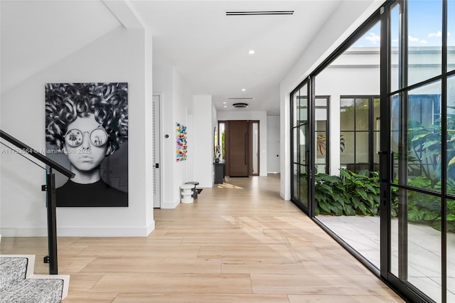 foyer entrance featuring light hardwood / wood-style floors