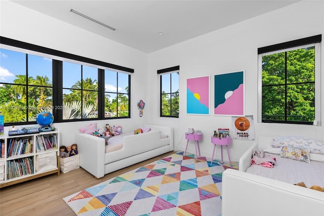 bedroom with light hardwood / wood-style floors