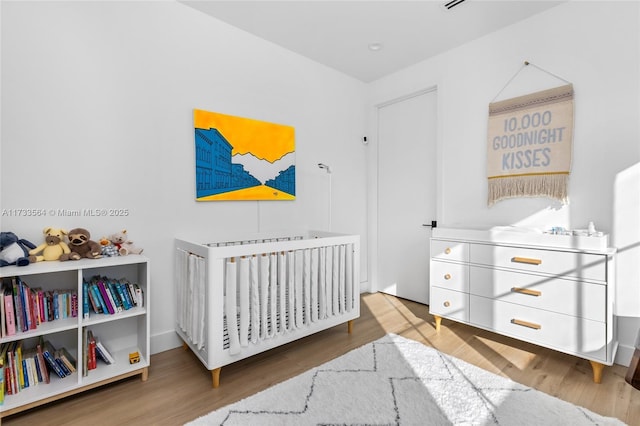 bedroom featuring hardwood / wood-style flooring