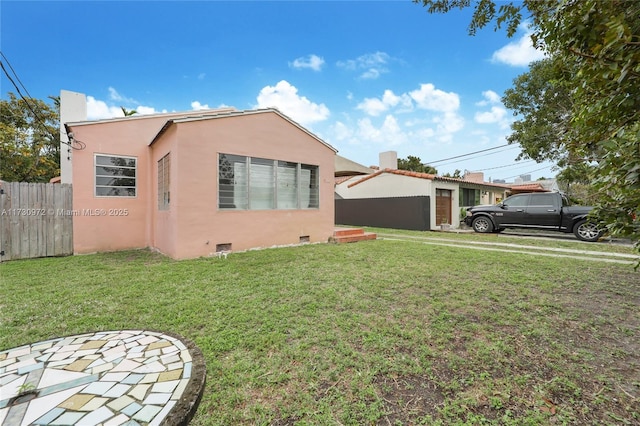 exterior space featuring a front lawn