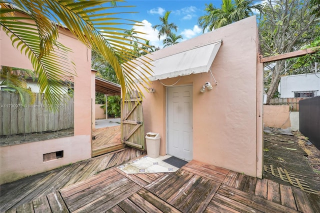 exterior space featuring a wooden deck