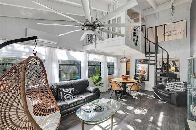 living area featuring a high ceiling, a ceiling fan, stairway, beam ceiling, and dark wood finished floors