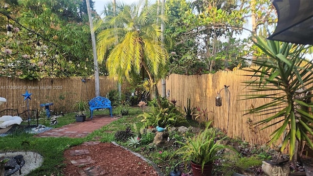 view of yard with a patio area and fence