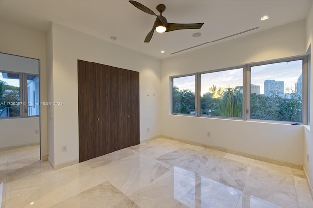 unfurnished bedroom with ceiling fan