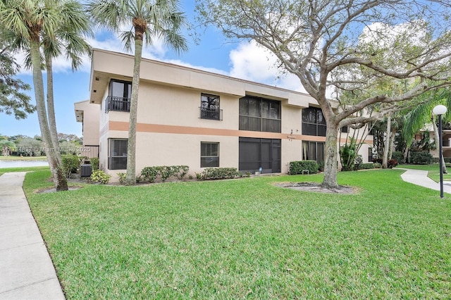 view of property featuring central AC unit