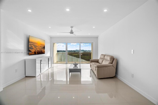 living room with ceiling fan