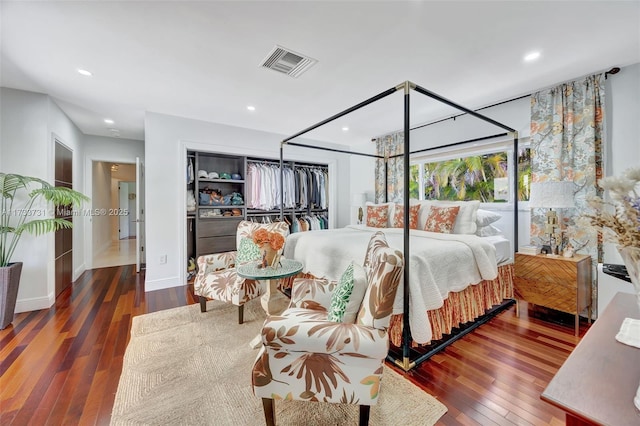 bedroom featuring dark hardwood / wood-style floors