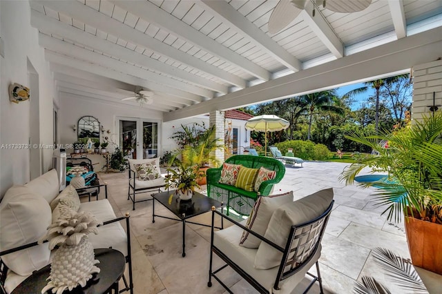 view of patio featuring an outdoor hangout area and ceiling fan