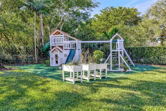 view of play area featuring a lawn