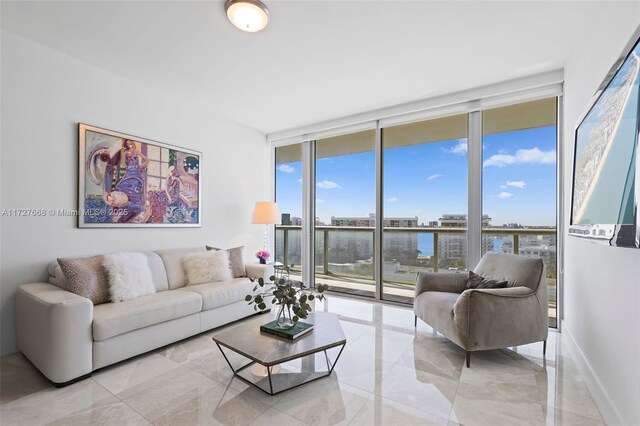 living room with floor to ceiling windows