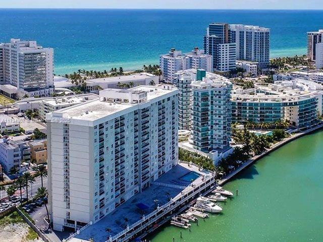 bird's eye view with a water view