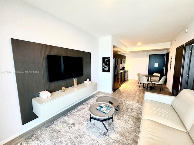 living room with wood-type flooring