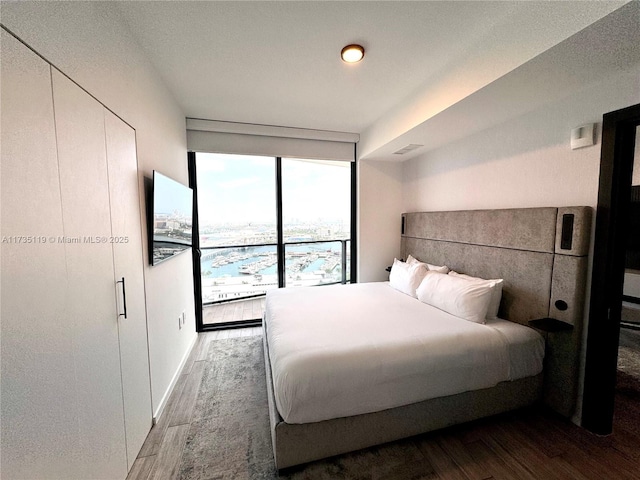 bedroom featuring hardwood / wood-style floors