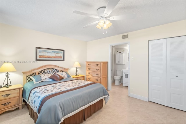 bedroom with ceiling fan, connected bathroom, a closet, and a textured ceiling