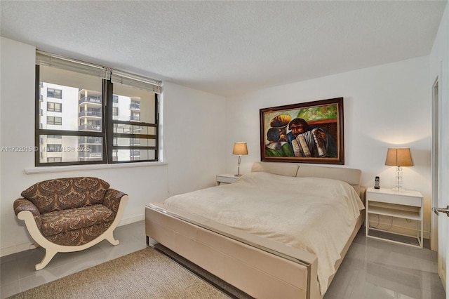 bedroom with a textured ceiling