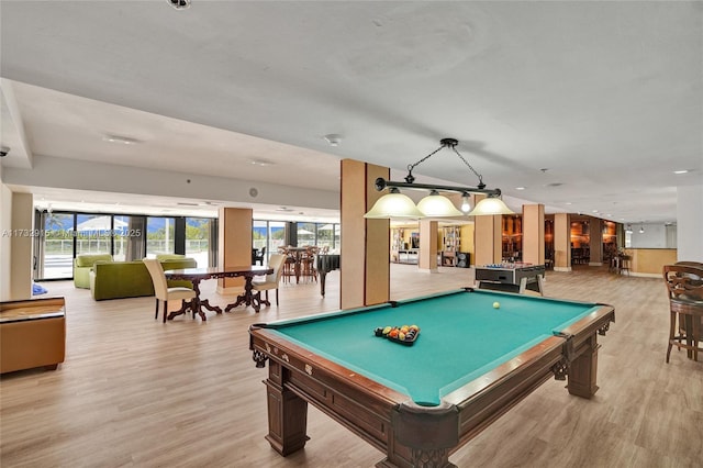 recreation room featuring pool table and light hardwood / wood-style flooring