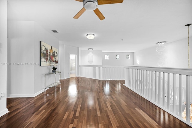 unfurnished room featuring dark hardwood / wood-style flooring