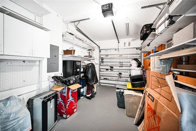 garage featuring a garage door opener and electric panel