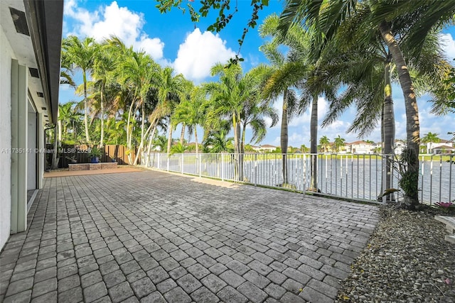 view of patio / terrace with a water view