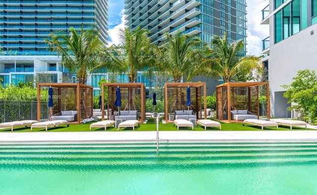 view of swimming pool featuring an outdoor living space