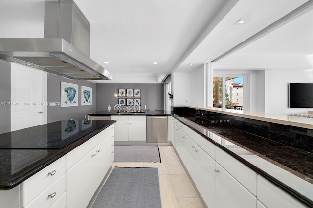 kitchen with white cabinetry, island range hood, light tile patterned flooring, black electric cooktop, and stainless steel dishwasher