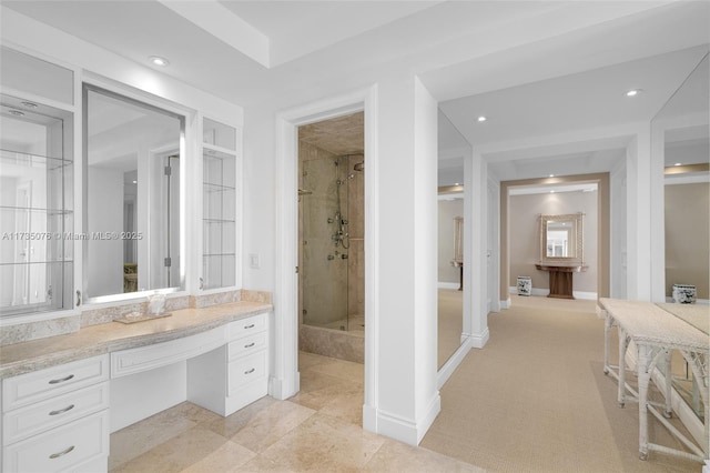 bathroom featuring vanity and walk in shower