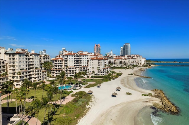 bird's eye view with a beach view and a water view