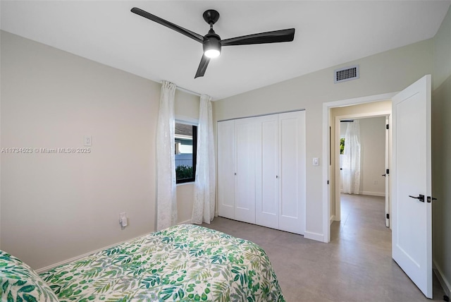 bedroom featuring ceiling fan and a closet