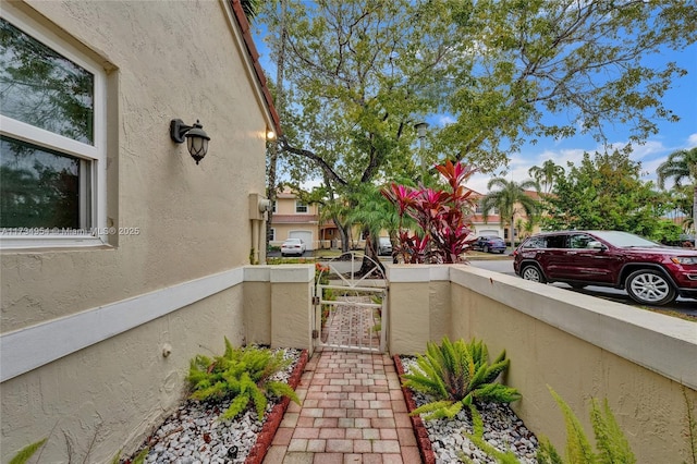 exterior space featuring stucco siding