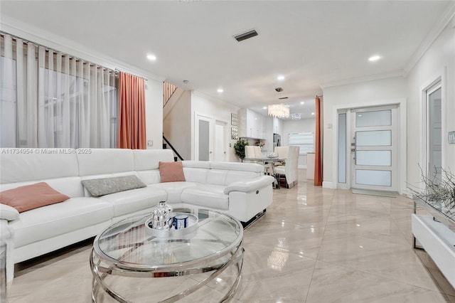 living room with crown molding, marble finish floor, stairs, and visible vents
