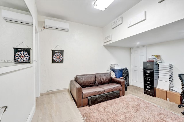 sitting room with a wall mounted air conditioner