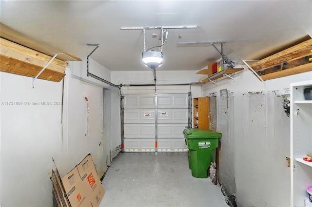 garage featuring a garage door opener