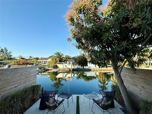 view of water feature with a dock