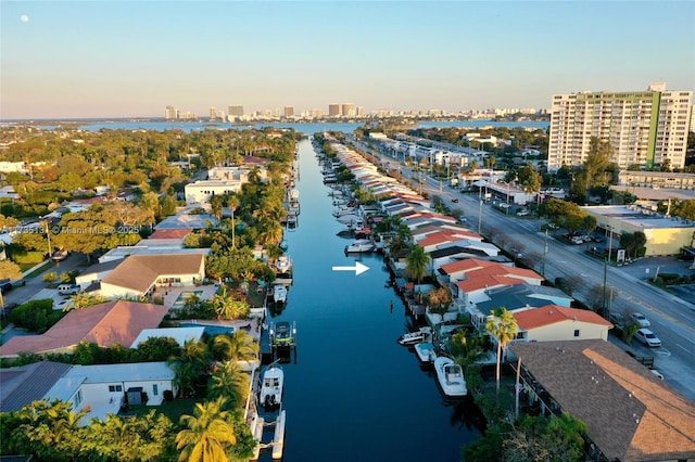 aerial view at dusk with a water view