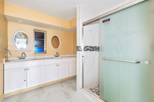 bathroom with vanity and an enclosed shower