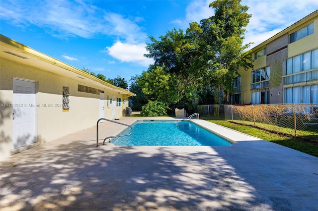 view of pool with a patio