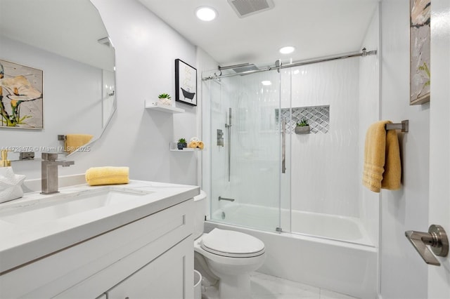 full bathroom featuring enclosed tub / shower combo, vanity, and toilet